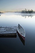 Mists and canoe