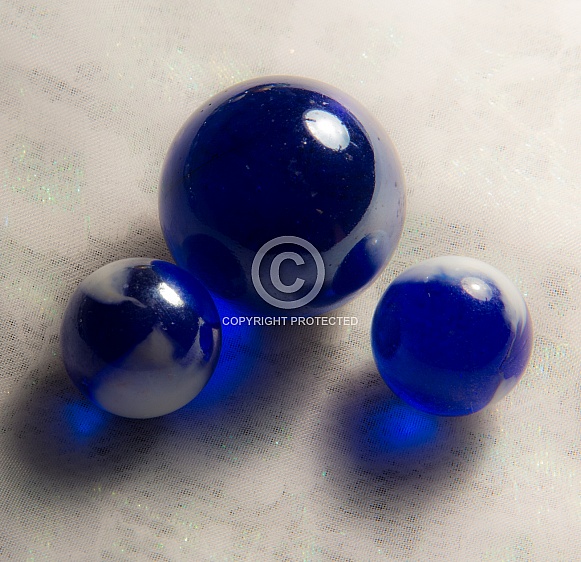 Three Blue Marbles