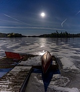 Moon rising on the frozen lake