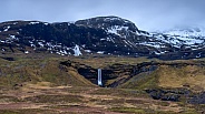 Random waterfall that looks like it's in the middle of a heart in Iceland