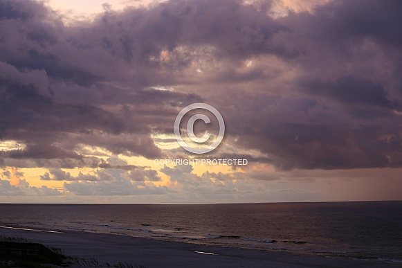 Evening Sun setting over the Gulf Shores Evening Sun setting over the Gulf Shores