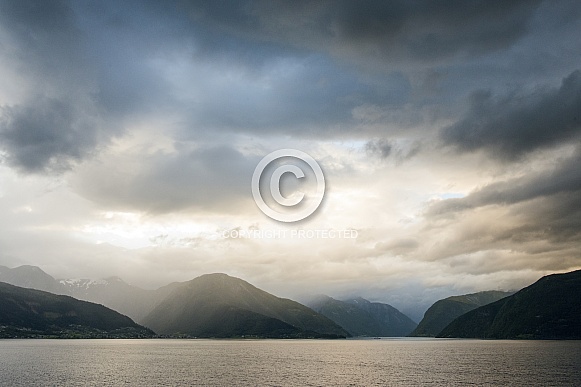 Misty mountains across the sea Misty mountains across the sea