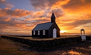 Black church in Iceland at sunrise