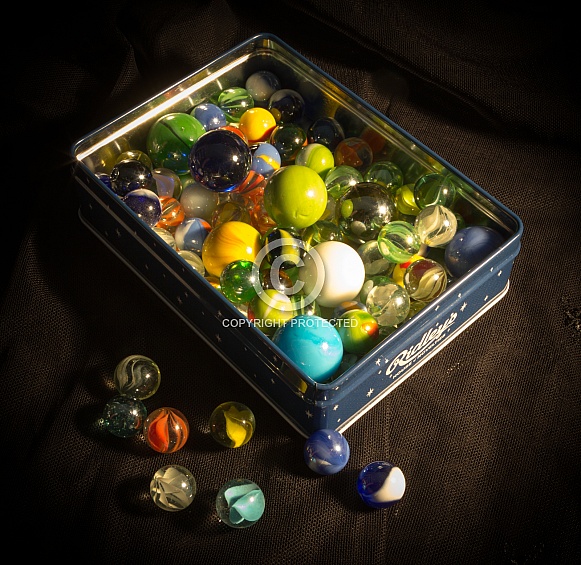 Marbles in a Tin