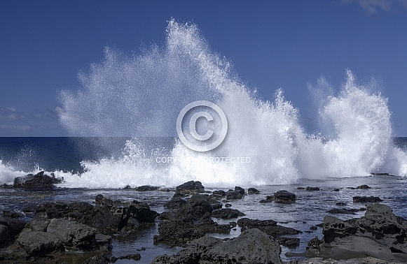 Waves splashing on coastal rocks Waves splashing on coastal rocks