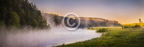Landscape with river in fog