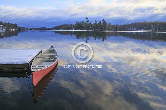 Little red canoe in Winter