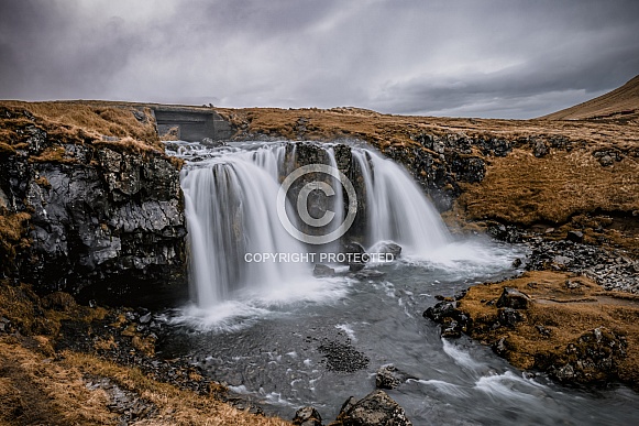 Confess waterfall on a dark day Confess waterfall on a dark day