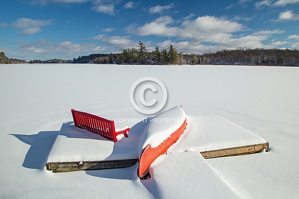 Little red canoe in Winter