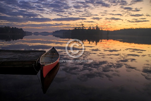 Sunrise and the red canoe