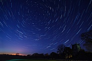 Star Trails above a village in North Yorkshire - England